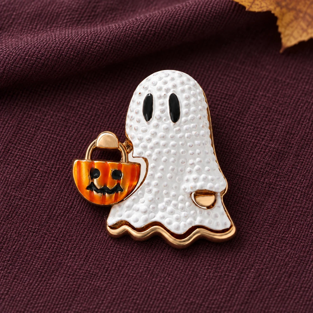 Usva ghost and pumpkin bucket brooch on plum cloth