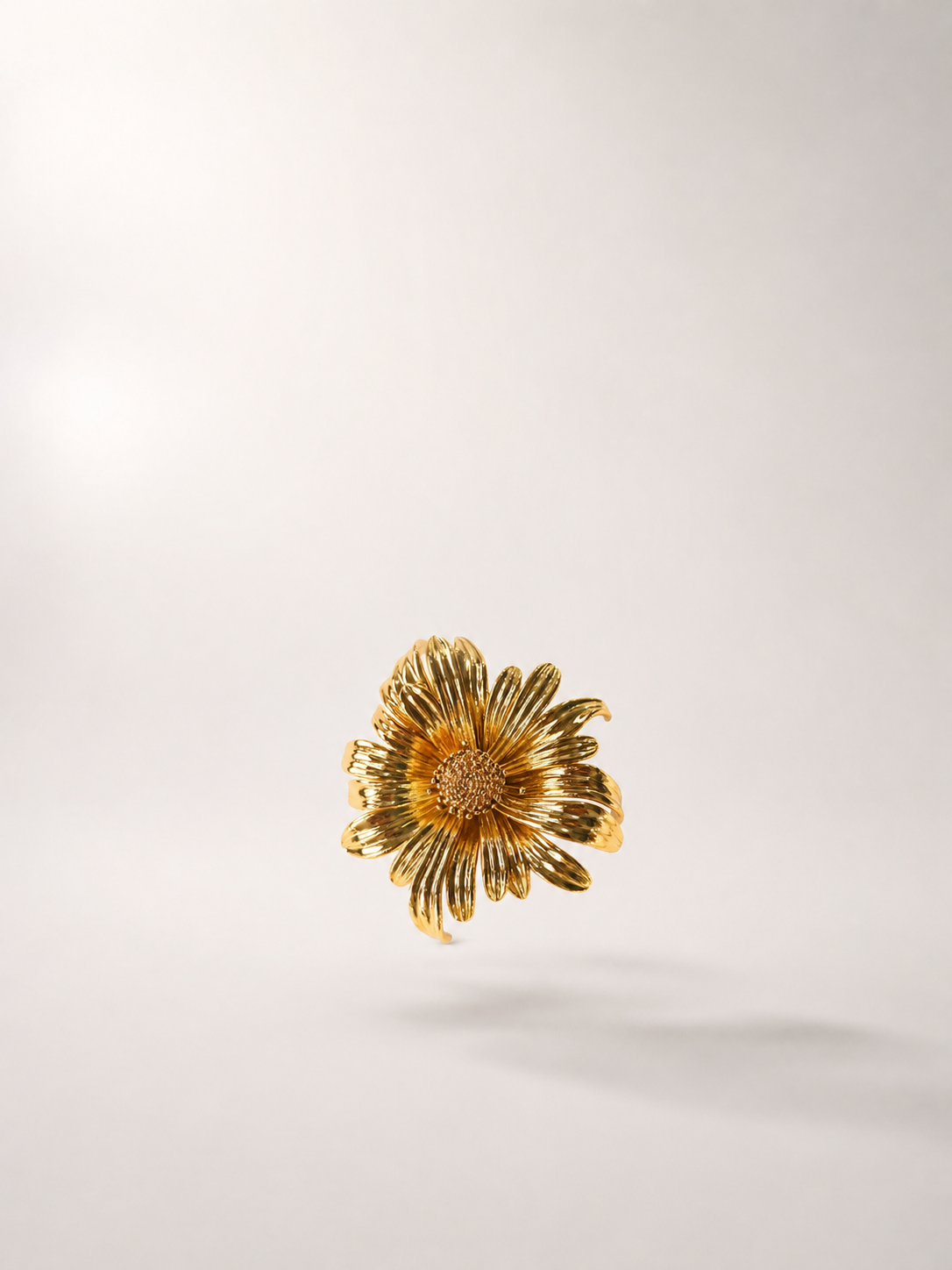 TUUGLOW sculptural brooch collection