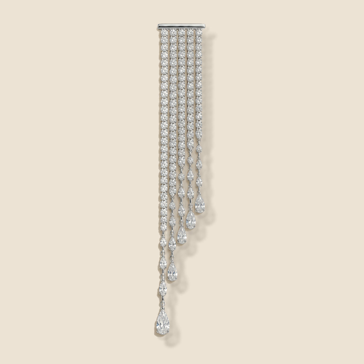 Kajo Crystal Cascade Brooch on an exact warm ivory background