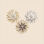 Meri Magnetic Bloom Brooch in three colourways on an exact warm ivory background