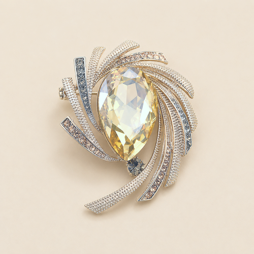 Astra Orbit Crystal Brooch on pale background