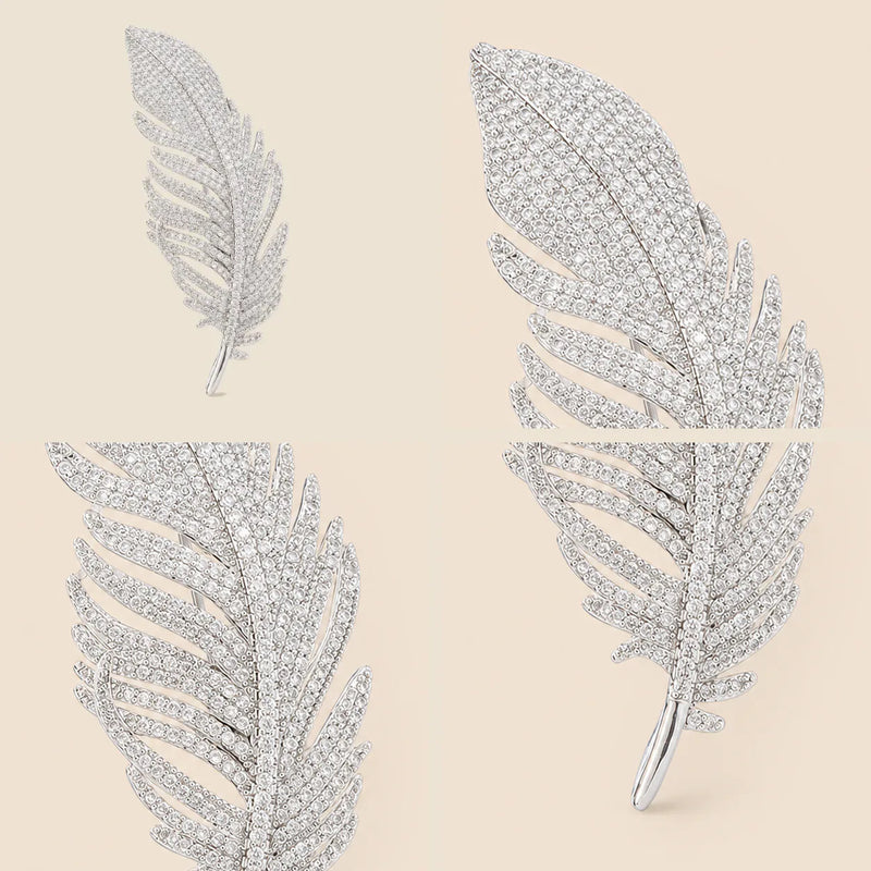 Four detail views of the Lumi Crystal Feather Brooch showing its crystal tip, open feather branches, curved vane and tapered stem