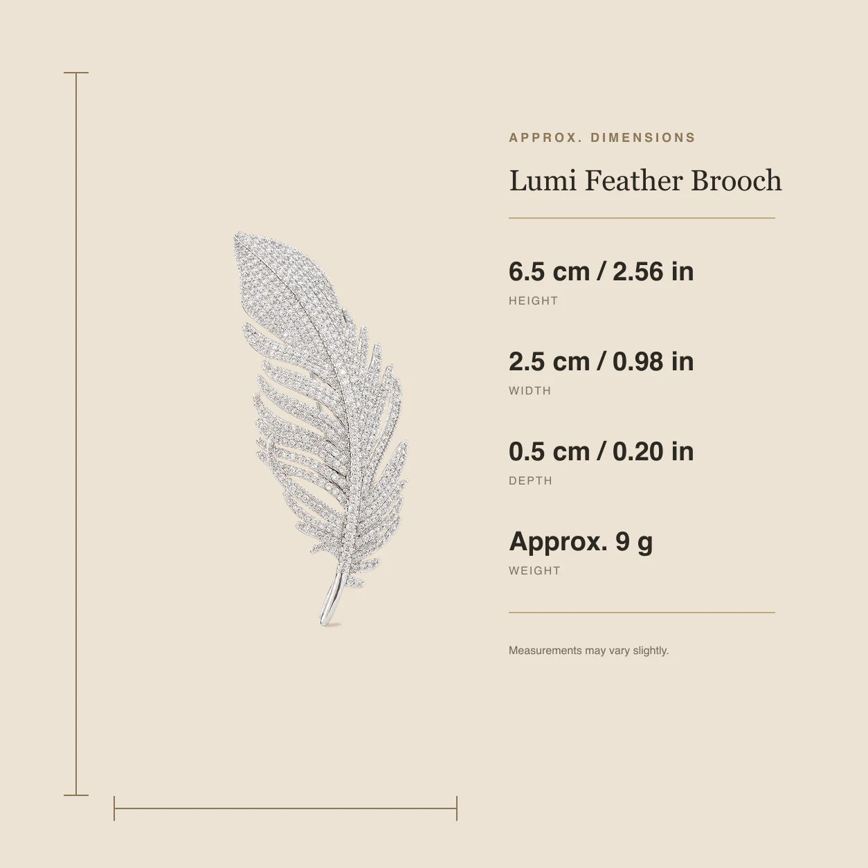 Lumi Crystal Feather Brooch size guide showing 6.5 cm height, 2.5 cm width, 0.5 cm depth and 9 g weight
