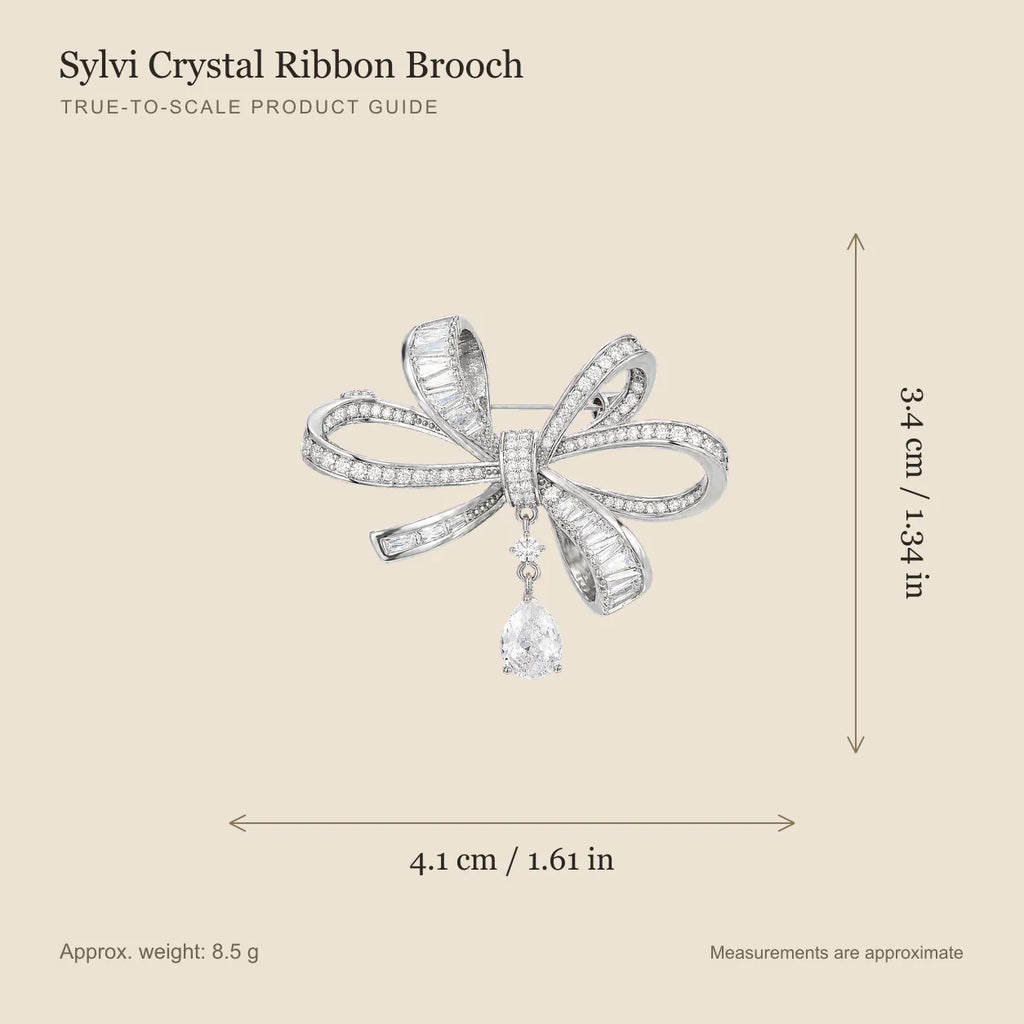 Sylvi Crystal Ribbon Brooch size guide showing 4.1 by 3.4 centimetres