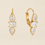 Gold crystal huggie earrings front and side view