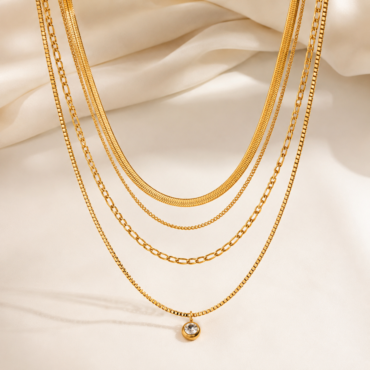 Close view of Sade Layered Gold Necklace with polished chain texture