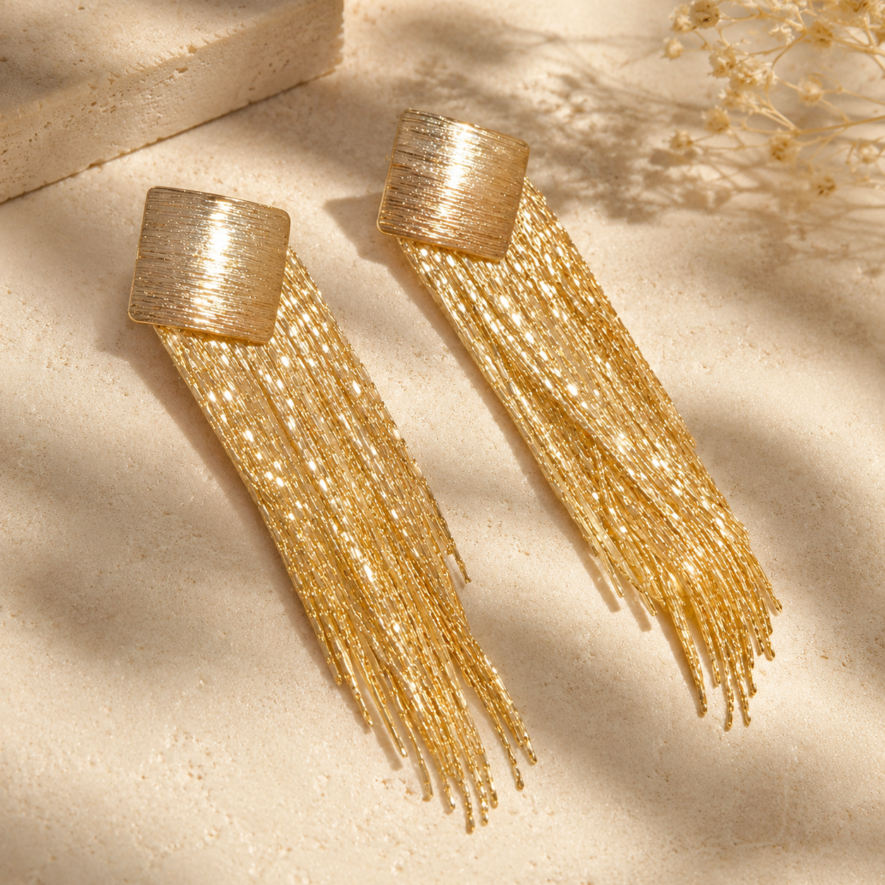 Virta Cascade Gold Earrings styled as light-catching everyday earrings