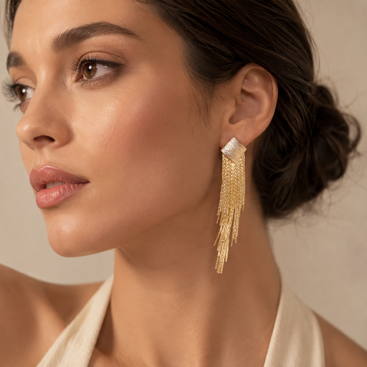 Virta Cascade Gold Earrings with flowing gold-tone drop silhouette