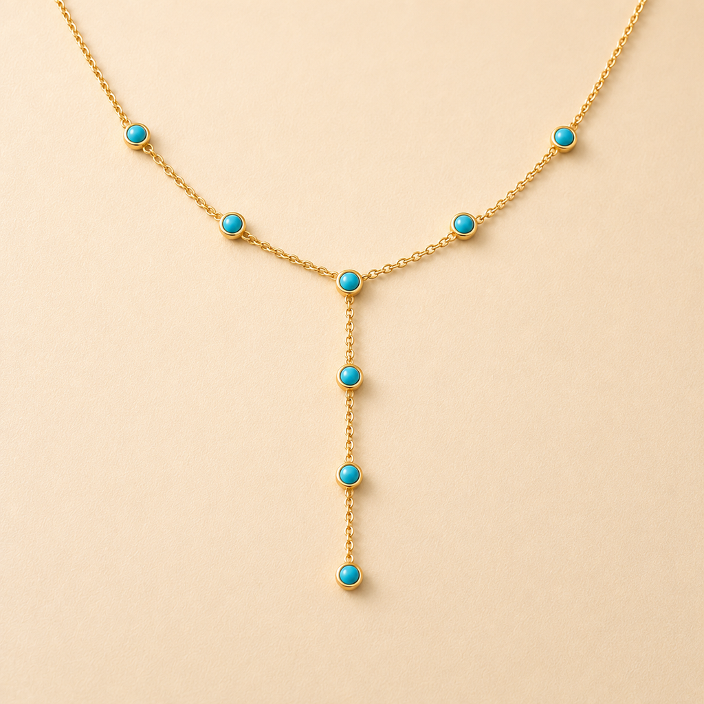 Nocturne Eye Charm Necklace with gold-tone chain and symbolic charm detail