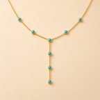 Nocturne Eye Charm Necklace with gold-tone chain and symbolic charm detail