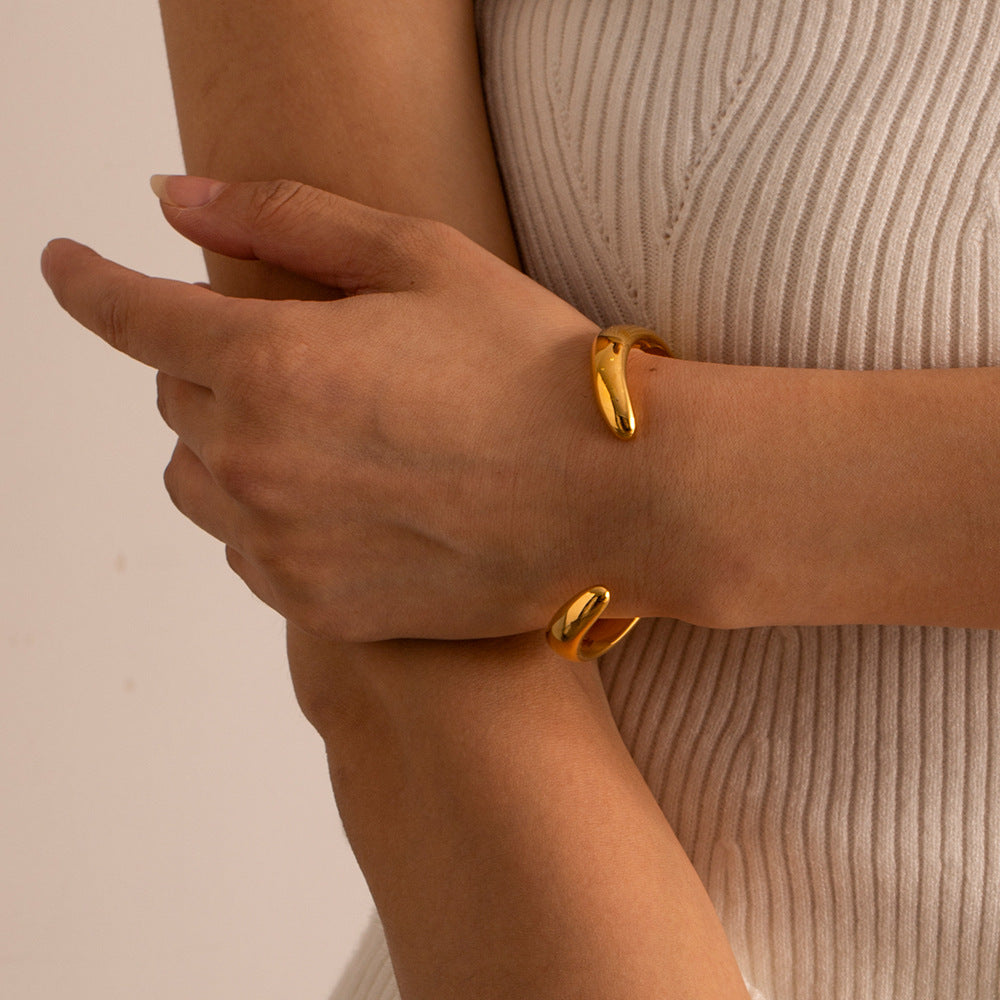 Aalto Heart Cuff Bracelet with open heart-inspired shape in warm gold tone