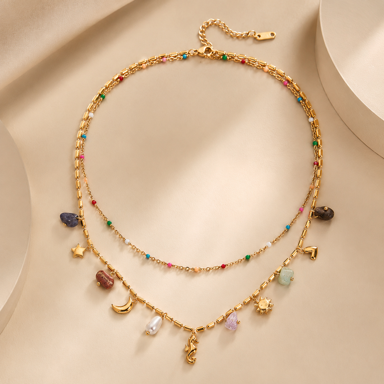Ranta Charm Necklace showing seaside-inspired charms on layered chains