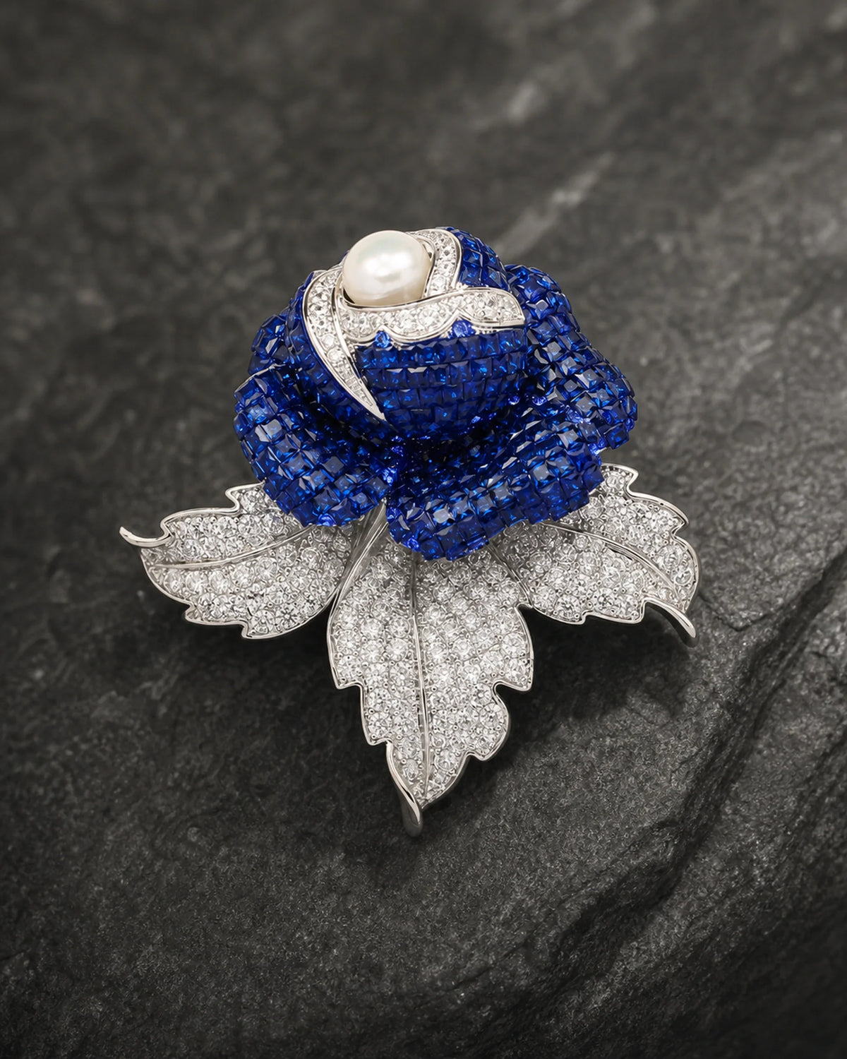Macro view of Aava's sapphire crystal petals, pearl-like centre and clear crystal leaves