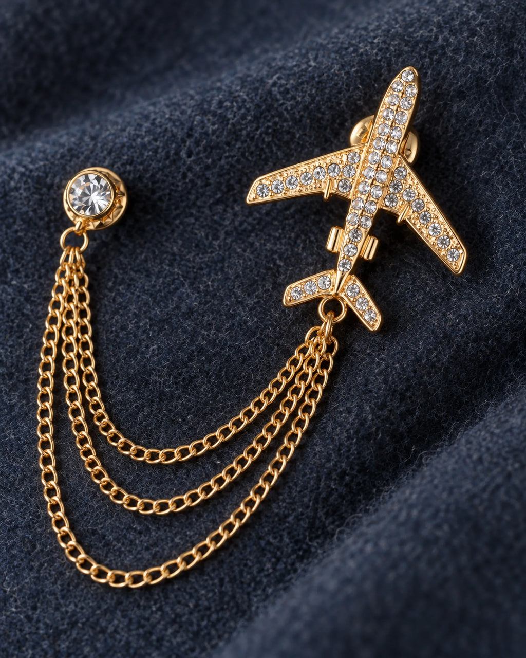 Aero Airplane Lapel Chain Brooch in gold-tone finish; detail of the motif and chain connections