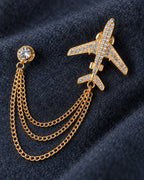 Aero Airplane Lapel Chain Brooch in gold-tone finish; detail of the motif and chain connections