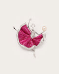 Aila Crystal Ballerina Brooch in silver tone and fuchsia on a continuous warm pale background