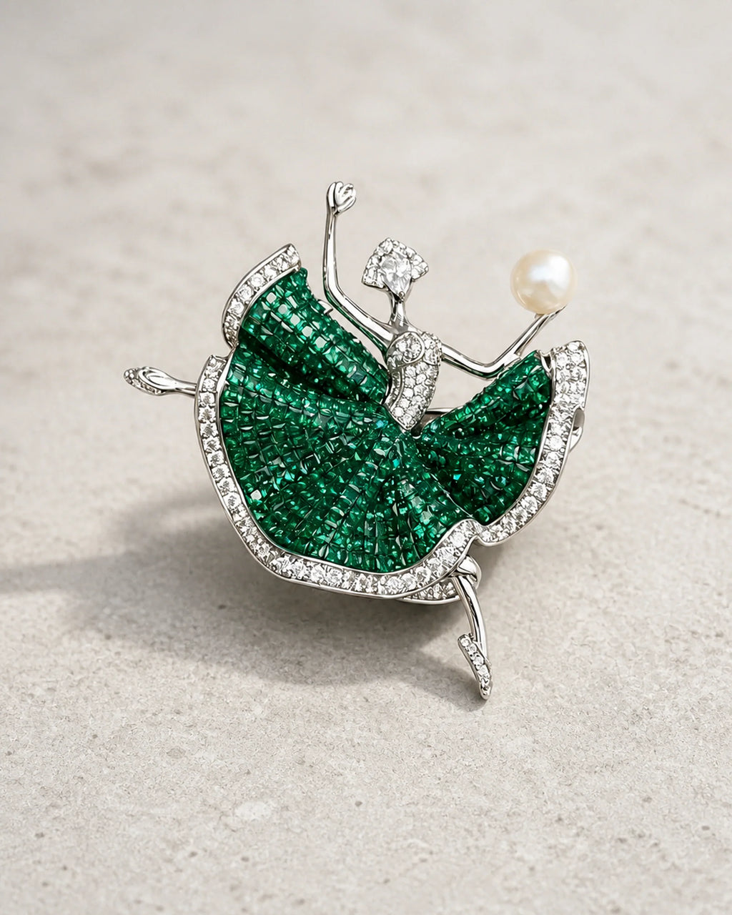 Aila ballerina brooch in silver tone and emerald green on limestone
