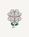 Aili Clear Zircon Clover Brooch shown complete on a warm plain background.