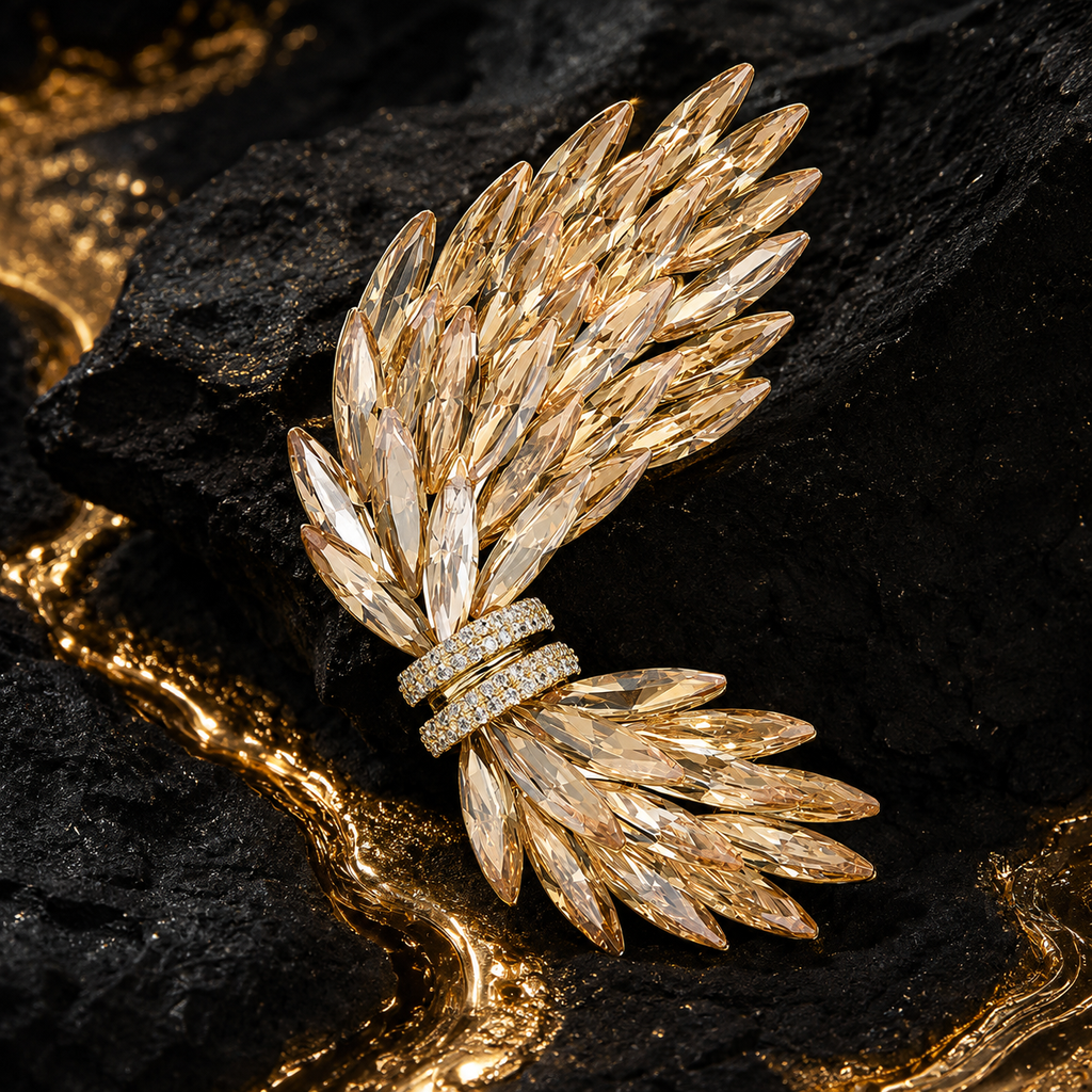 Aurelia Wing Crystal Brooch on black marble