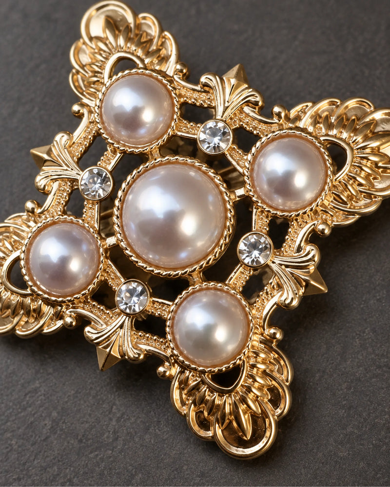 Dagny Pearl-Style Openwork Cross Brooch — raised ornament and surface details, macro view