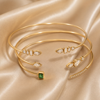 Elara Orbit Crystal Bangle product display on satin