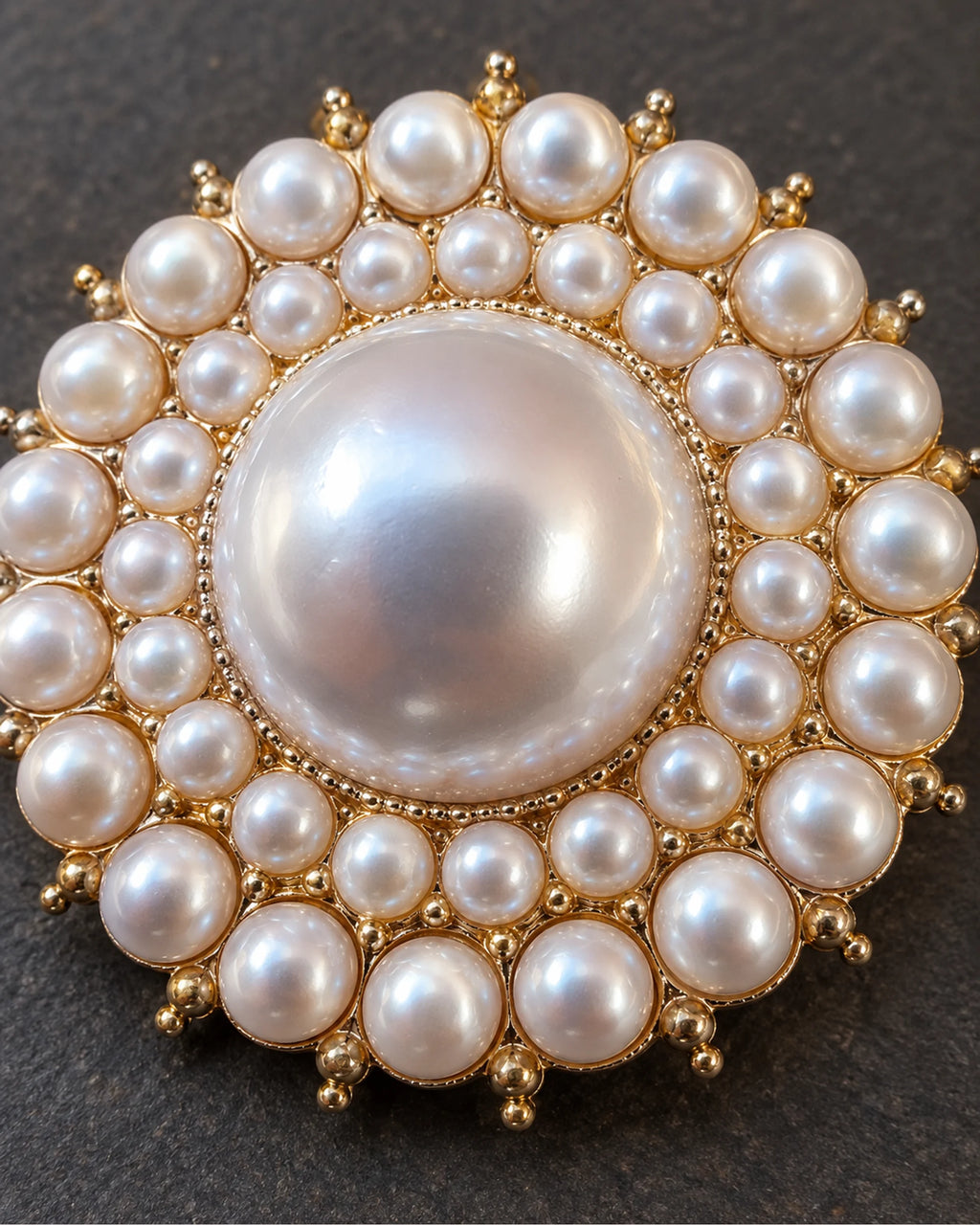 Elin Round Pearl-Style Cluster Brooch — raised ornament and surface details, macro view