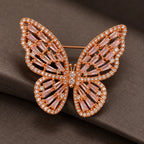 The Rose Gold & Pink finish reveals tapered baguettes, small clear edge stones and the spaces between wing ribs.