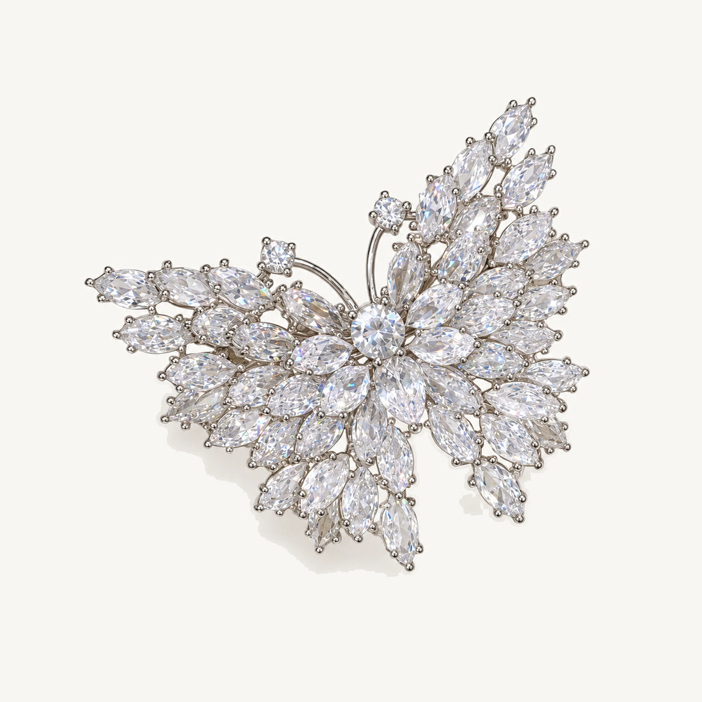 Eveli Marquise Crystal Butterfly Brooch in Silver, showing its complete spread-wing shape and clear marquise zircon accents.