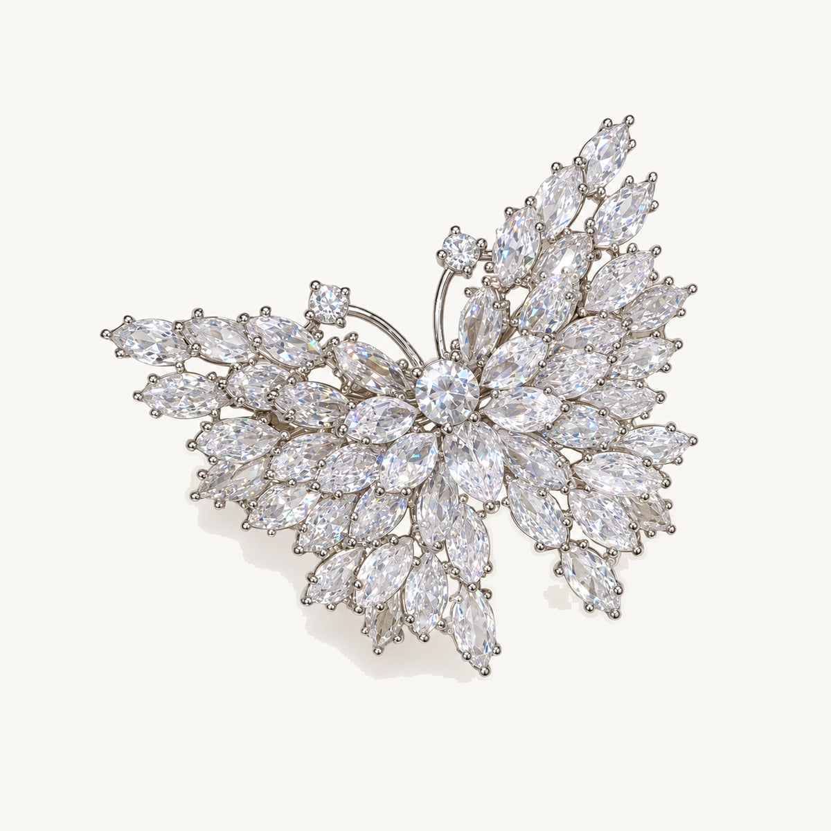 Eveli Marquise Crystal Butterfly Brooch in Silver, showing its complete spread-wing shape and clear marquise zircon accents.