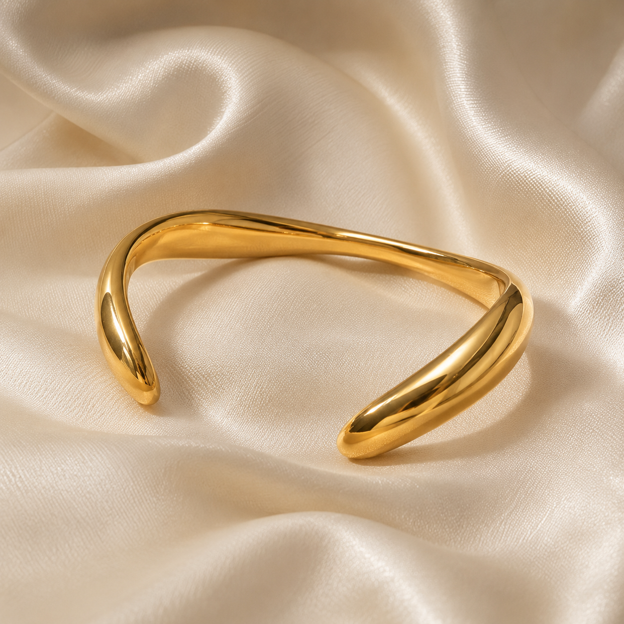 Aalto Heart Cuff Bracelet styled as a minimal gold wrist piece