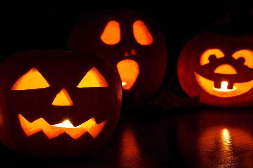 Faces Cut Into Pumpkin Light