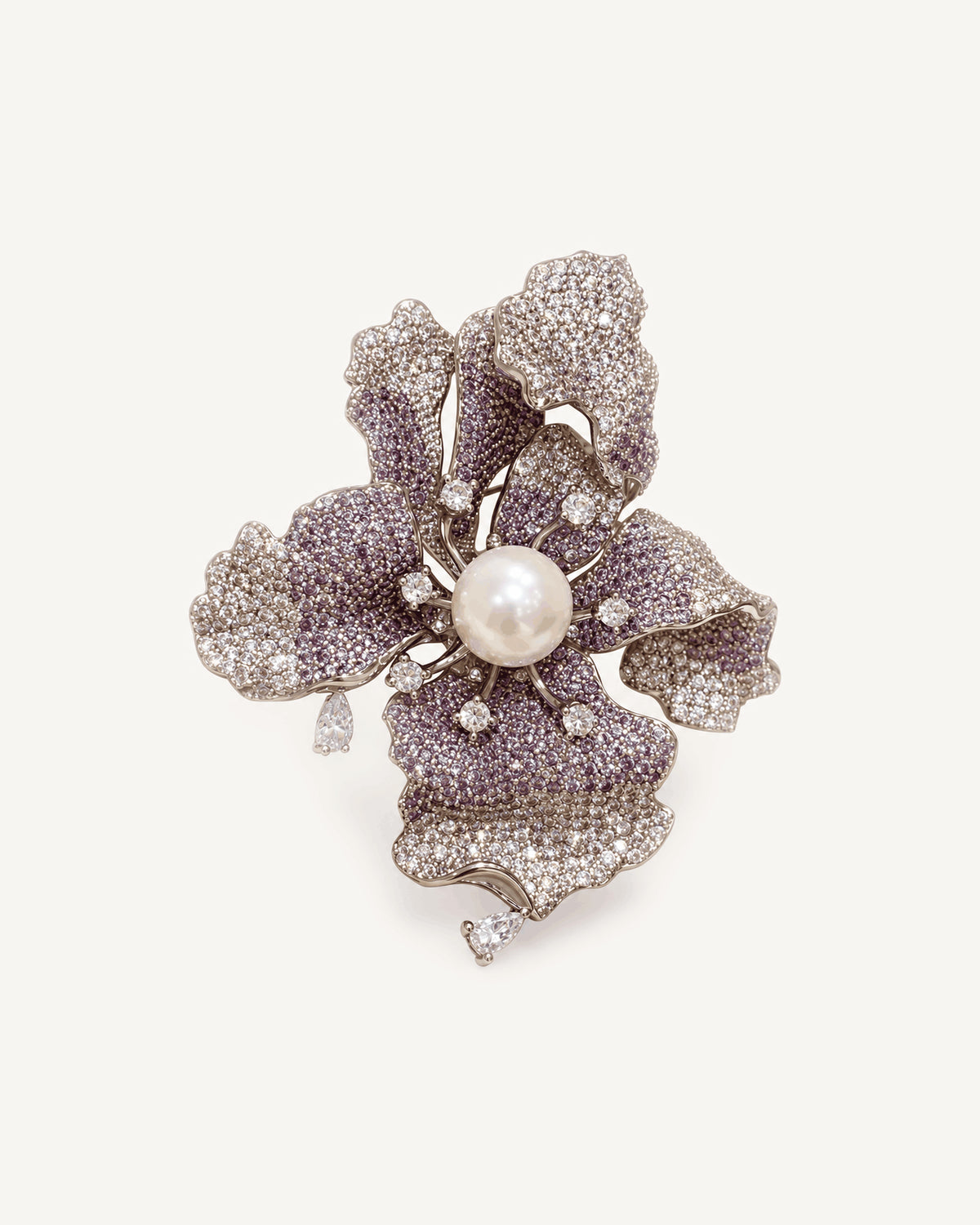 Iiris Lavender Zircon Iris Brooch with curled pavé petals and an imitation pearl centre.
