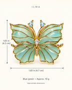 Ilma blue-green butterfly brooch dimensions: approximately 1.85 inches wide by 1.65 inches high, or 4.7 by 4.2 cm; approximately 10 grams.