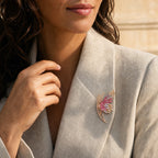 Pink gradient Isla Butterfly Brooch worn at true 8.3 cm scale on a tailored ivory blazer