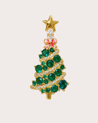 Joulu Bow Christmas Tree Brooch with green stones, a red bow and a gold-tone star.