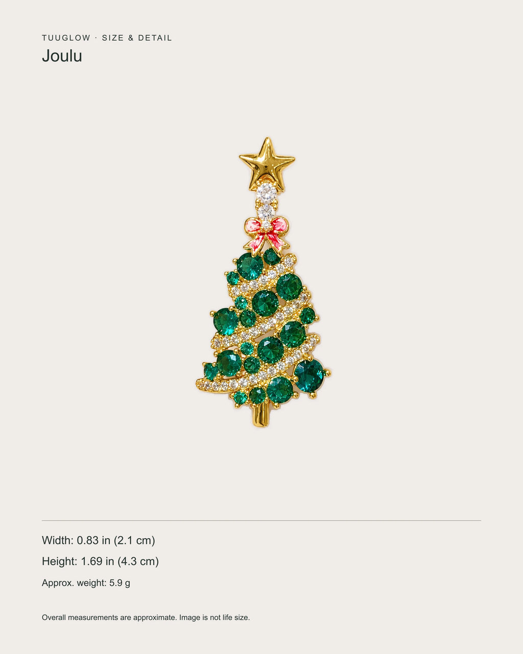 Christmas tree brooch overall dimensions: approximately 0.83 in wide by 1.69 in high (2.1 by 4.3 cm); weight 5.9 g.
