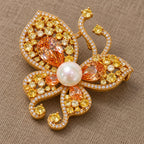 Kaisa Champagne Zircon Butterfly Brooch in an oblique front view showing raised settings and dimensional construction.
