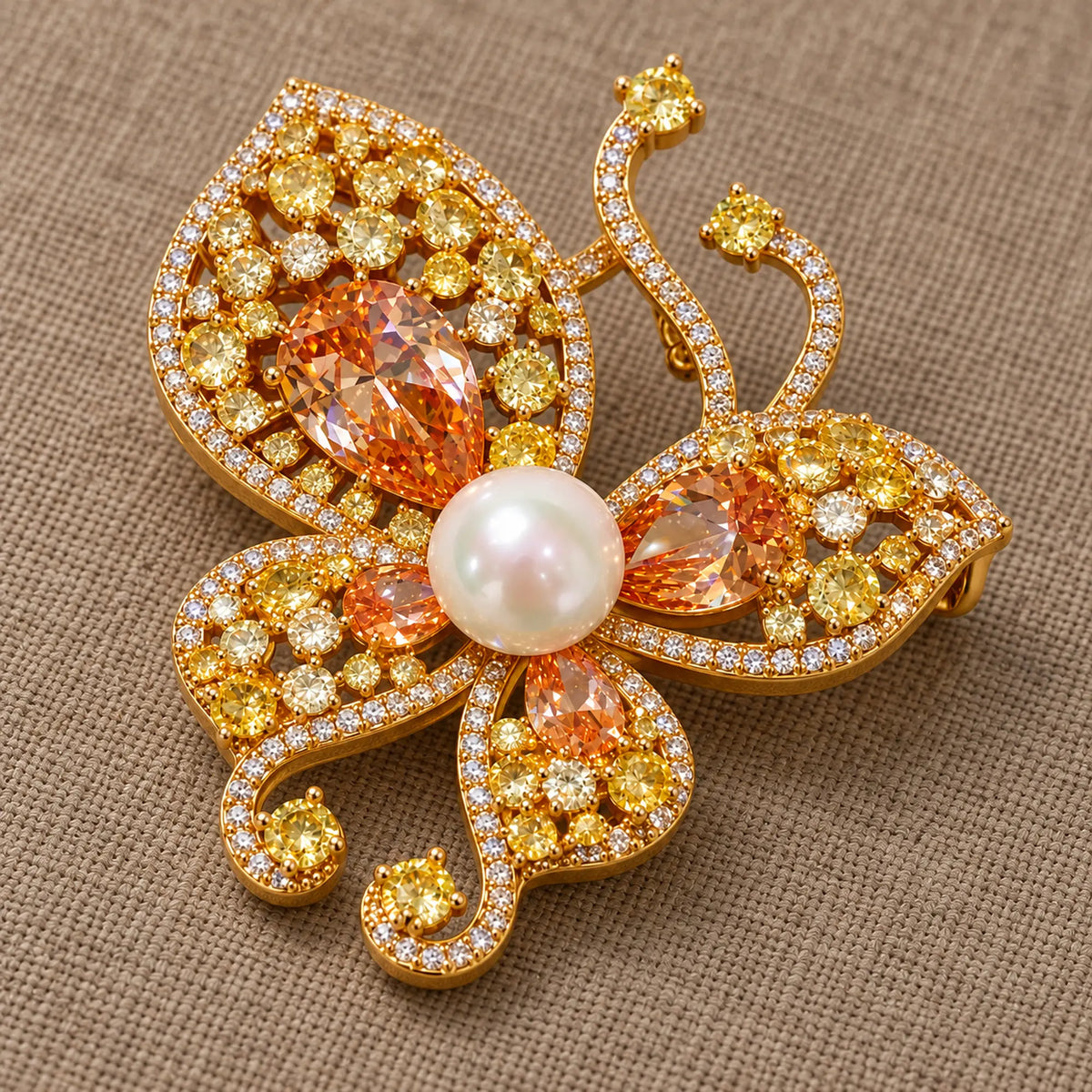 Kaisa Champagne Zircon Butterfly Brooch in an oblique front view showing raised settings and dimensional construction.