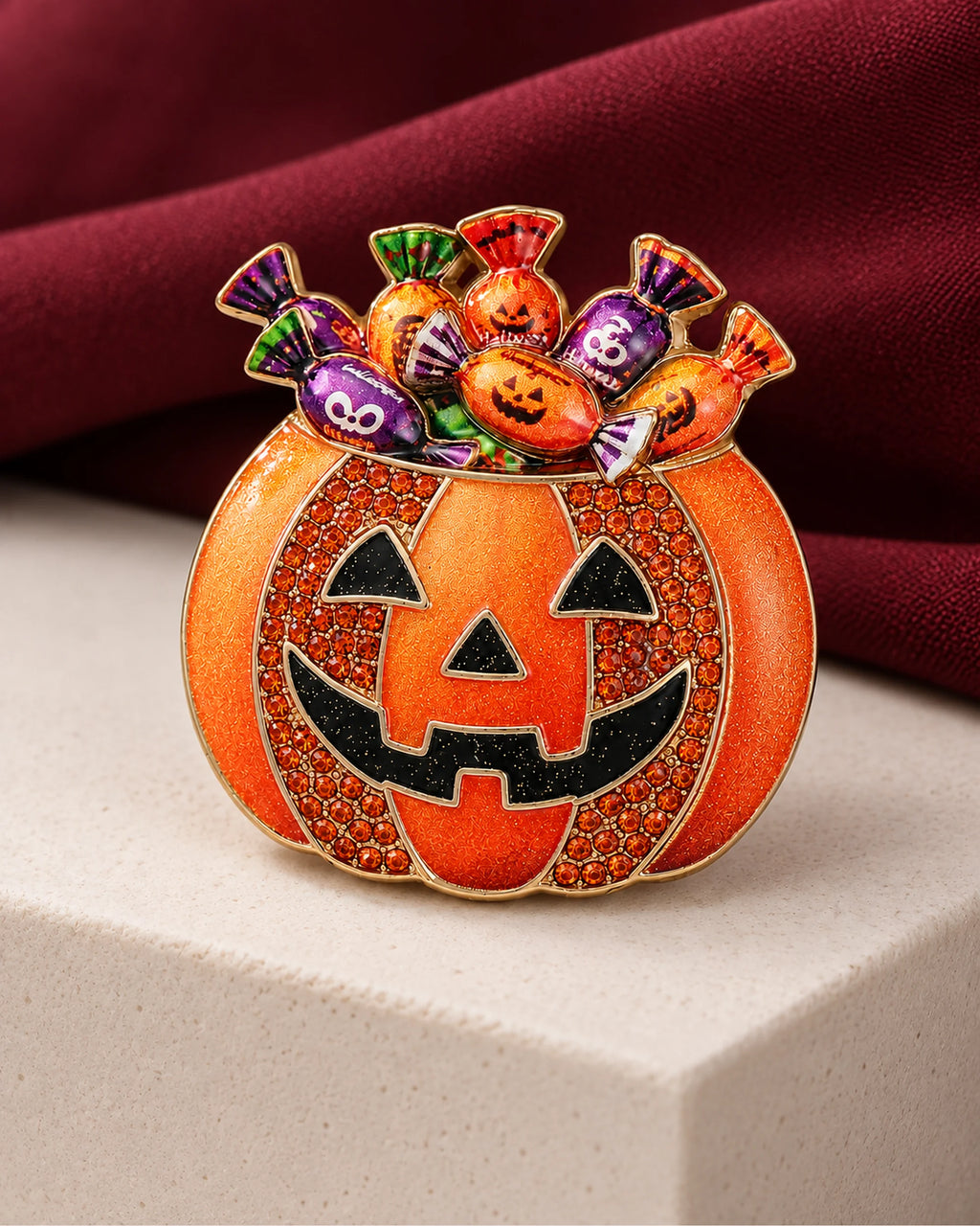 Karkki Candy Pumpkin Brooch in a product still life