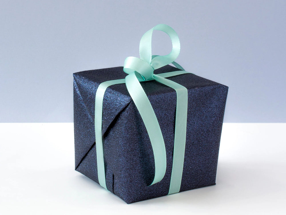 Ribbon Around a Blue Parcel