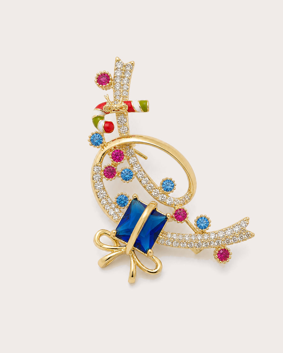 Lahja Blue Gift Ribbon Brooch with blue gift-box stone, multicolored accents and gold-tone curling ribbons.
