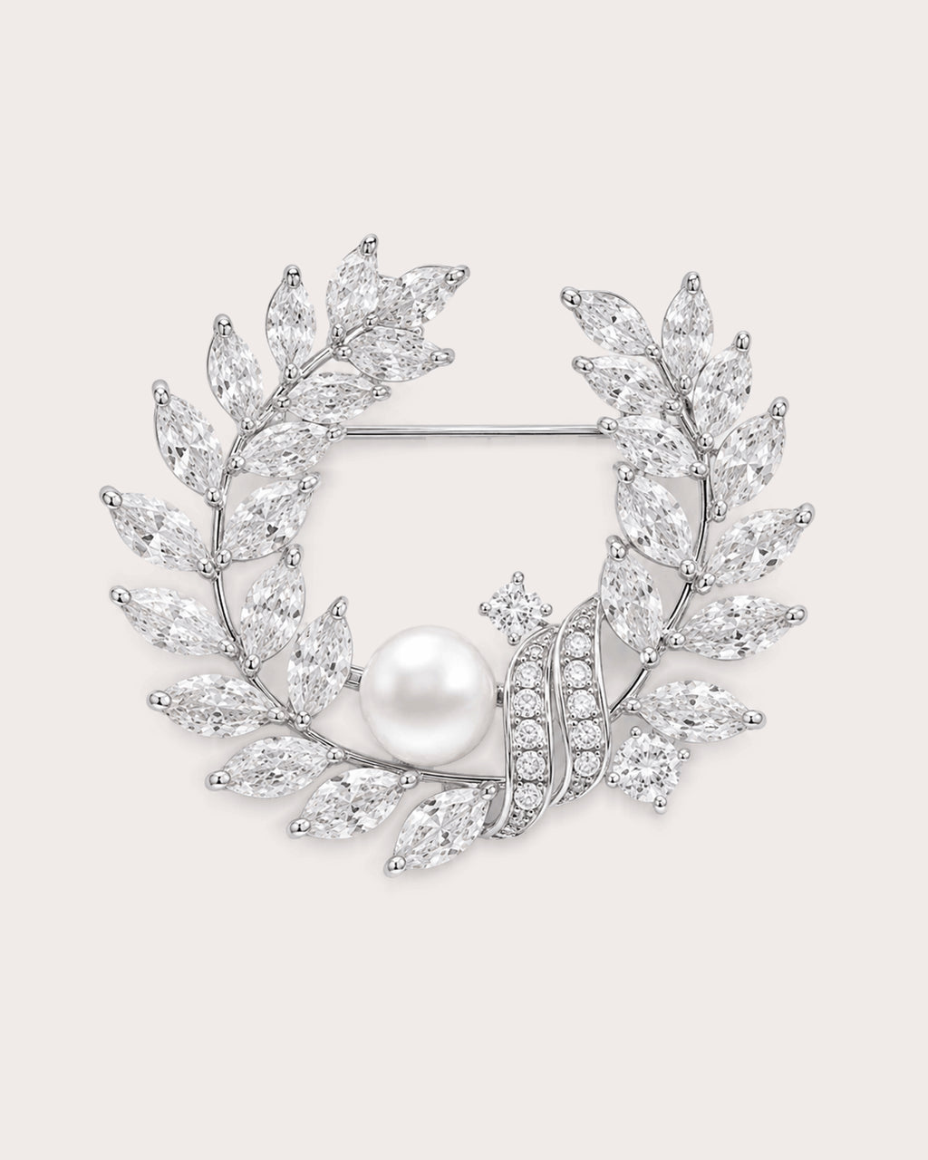 Laurea silver freshwater pearl leaf wreath brooch with clear stones and visible horizontal pin.