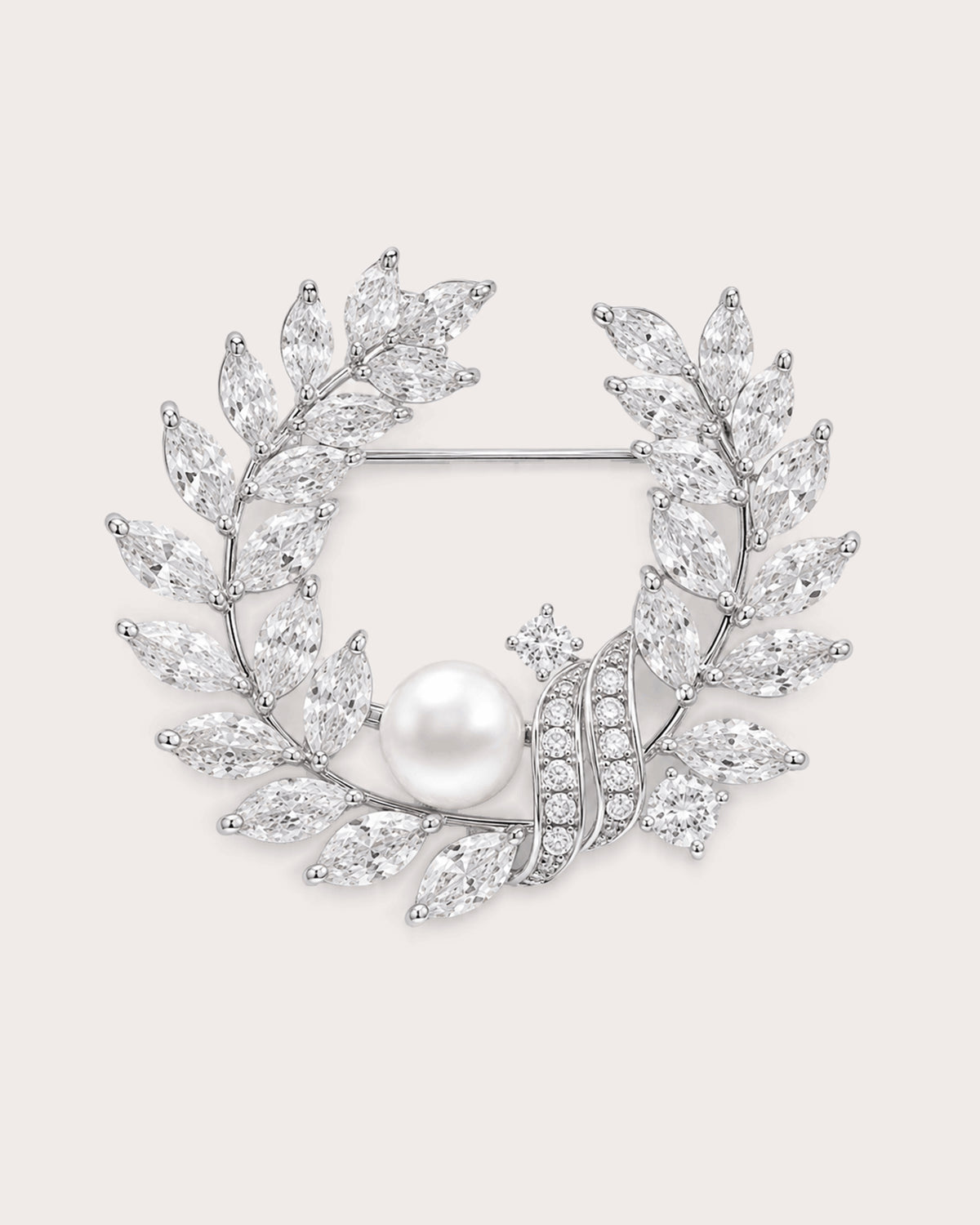 Laurea silver freshwater pearl leaf wreath brooch with clear stones and visible horizontal pin.