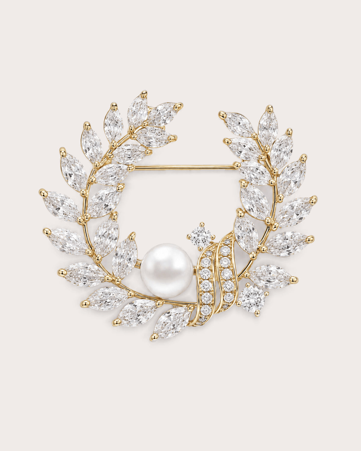Laurea gold-finish freshwater pearl leaf wreath brooch with clear stones and visible horizontal pin.