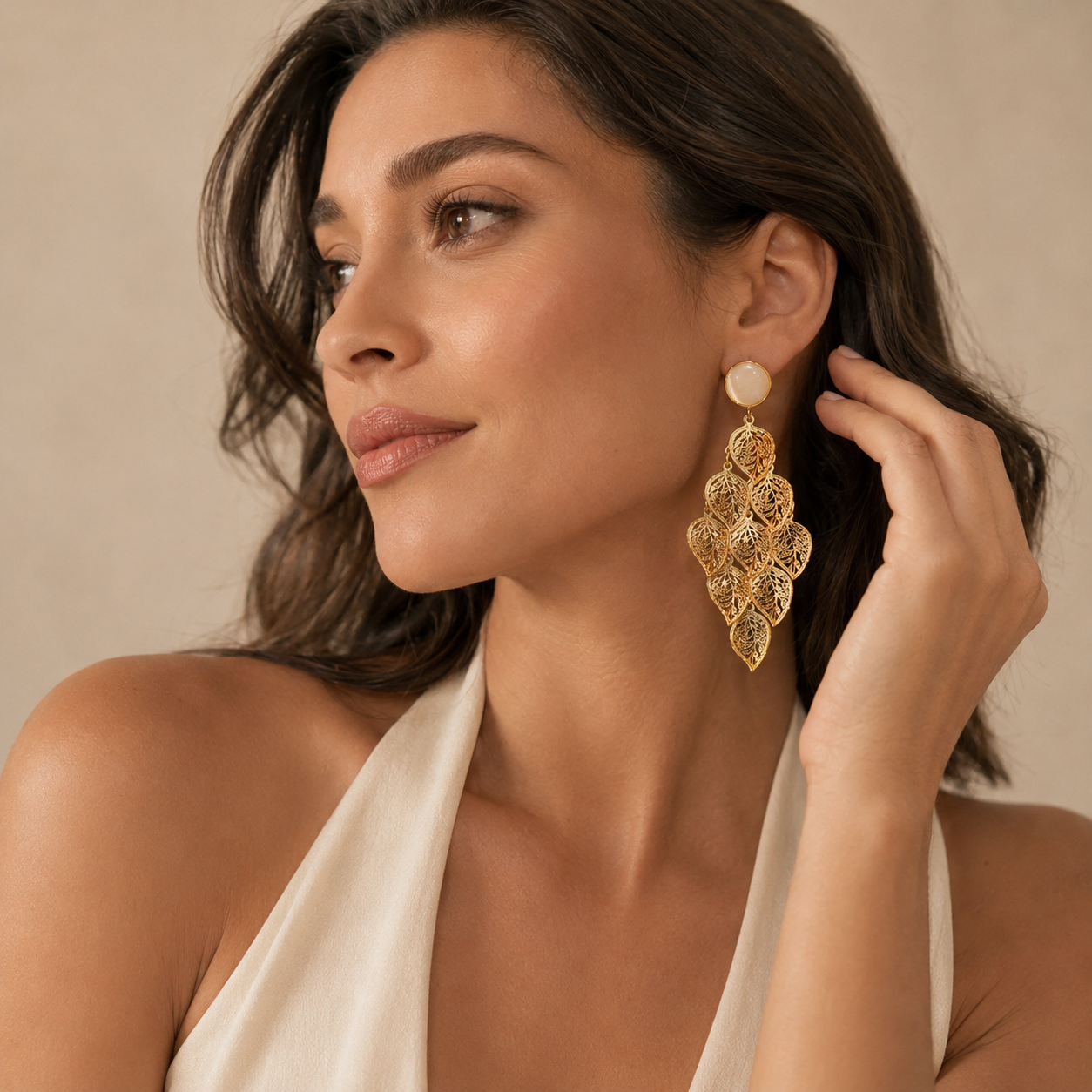 Lehti Gold Leaf Earrings showing layered leaf details and warm gold tone