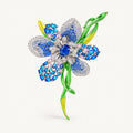 Malva Blue flower brooch with blue zircon accents, a silver-tone setting and green enamel stem.