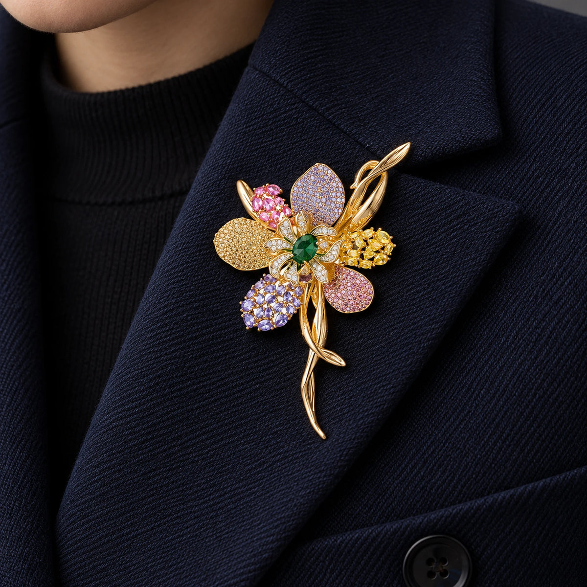 Malva Multicolor Zircon Flower Brooch pinned completely inside one broad navy wool lapel.