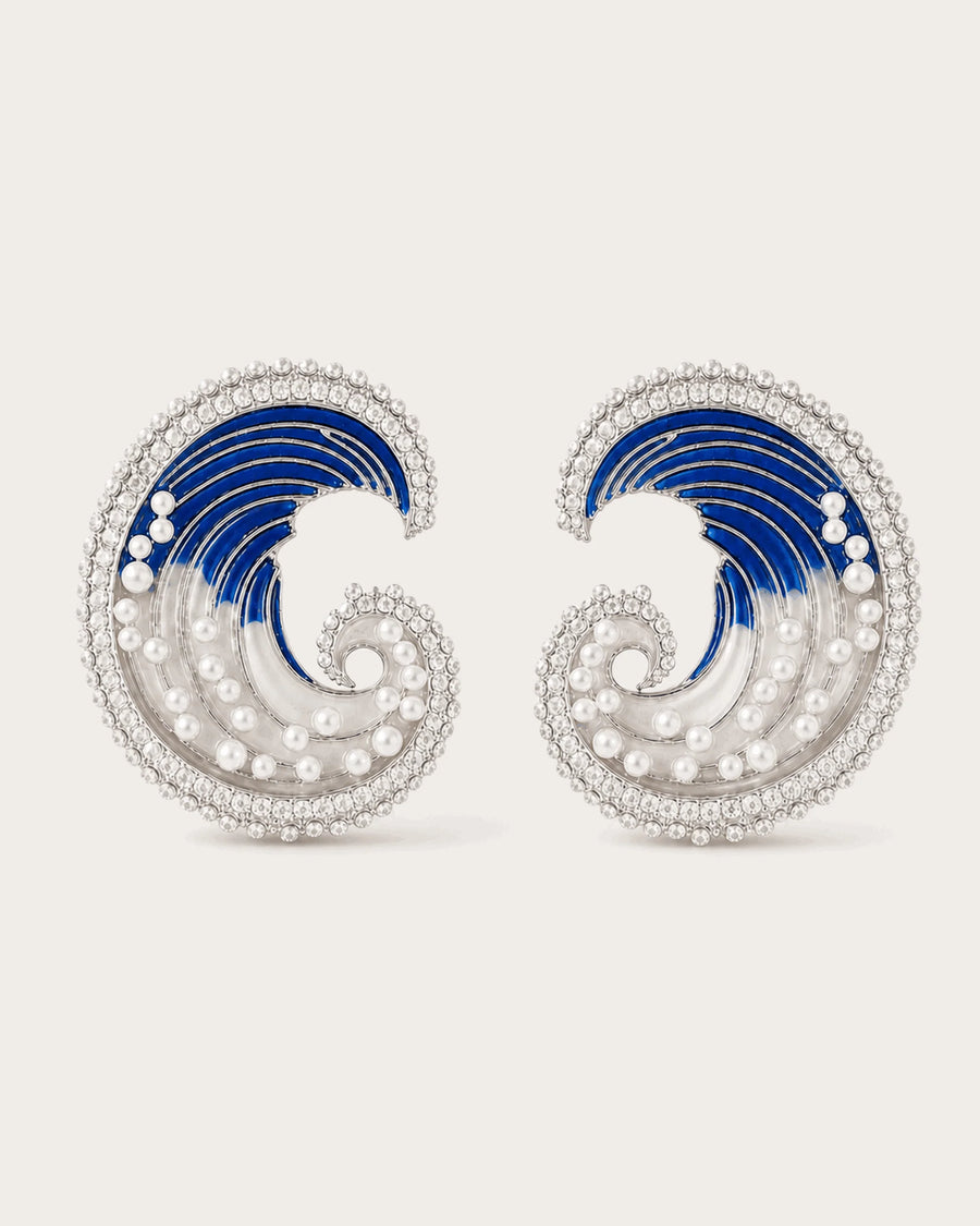 Marea Crystal Wave Stud Earrings in Silver Tone on a soft blush background