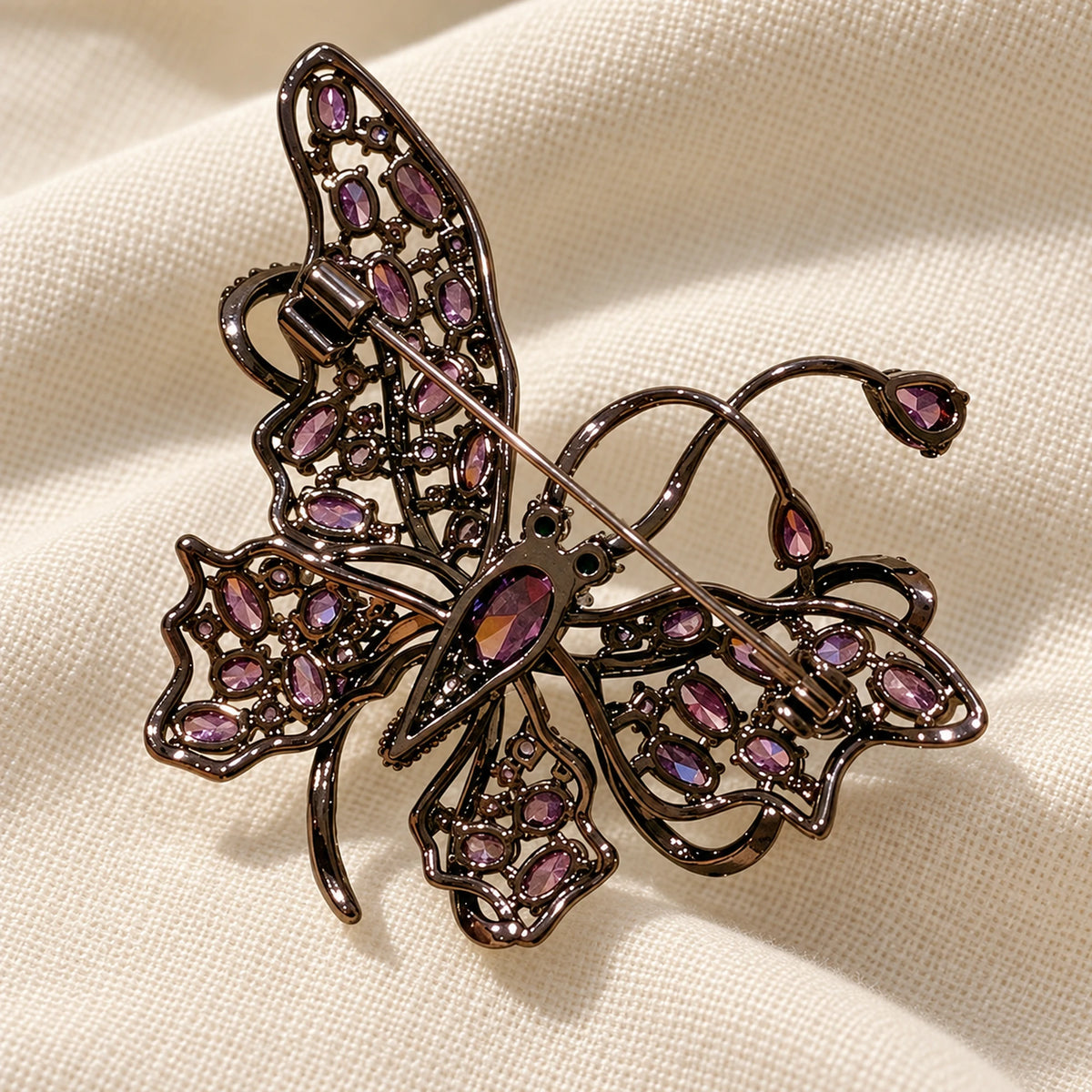 Rear view of Nemi Smoky Purple Butterfly Brooch showing the exact pin, catch and metal construction.