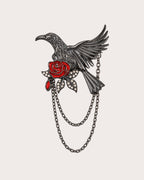 Noctra gunmetal-tone bird and red rose brooch with four stone leaves and two draped chains